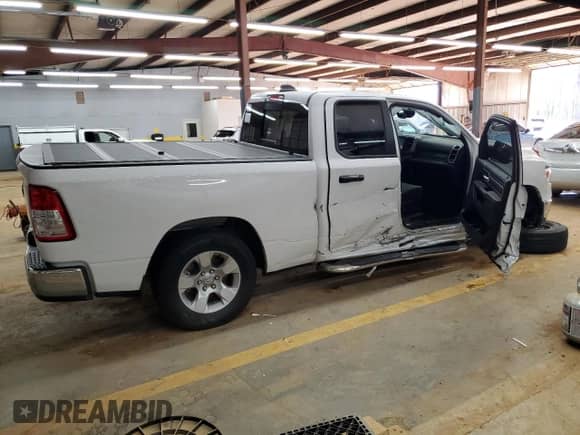 2023 Ram 1500 Big Horn with VIN 1C6SRFBT4PN609346, listed as a Copart auction lot 46477845 with 41,836 mi miles and Salvage title. Bid and sale history available at DreamBid. Image 3.