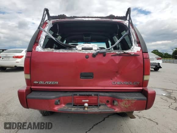 2000 Chevrolet Blazer LT with VIN 1GNCS13W8Y2317822, listed as a Copart auction lot 58868935 with 160,788 mi miles and Clean title. Bid and sale history available at DreamBid. Image 6.