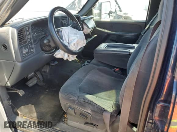 2002 Chevrolet Silverado 2500HD LS z VIN 1GCHK23G02F121208, wystawiony jako Copart lot #75267464 z przebiegiem 158 701 mil mil oraz Szkoda całkowita • Salvage title. Historia ofert i sprzedaży dostępna na DreamBid. Obrazek 7.