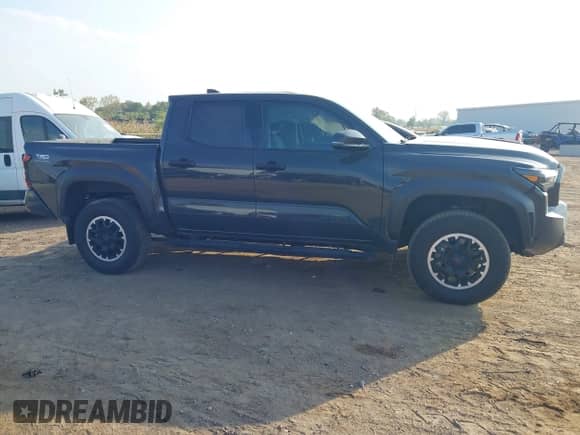 2024 Toyota Tacoma SR5 with VIN 3TYLB5JN7RT001210, listed as a IAAI auction lot 43255026 with 16,983 mi miles and . Bid and sale history available at DreamBid. Image 13.