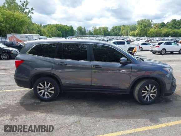 2019 Honda Pilot EX-L z VIN 5FNYF6H5XKB018384, wystawiony jako IAAI lot #43167792 z przebiegiem Nie podano mil oraz . Historia ofert i sprzedaży dostępna na DreamBid. Obrazek 13.