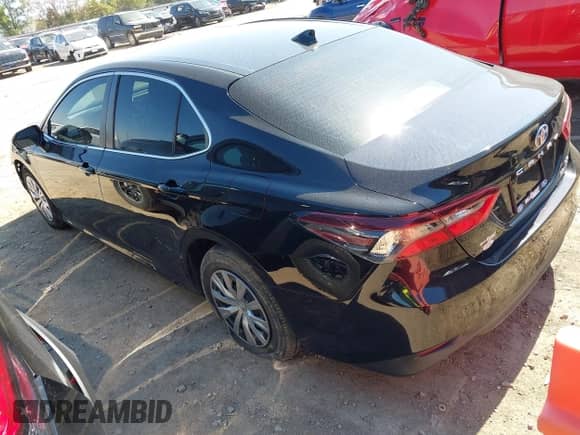 2022 Toyota Camry Hybrid LE with VIN 4T1C31AK9NU592164, listed as a IAAI auction lot 43394960 with 56,727 mi miles and . Bid and sale history available at DreamBid. Image 3.