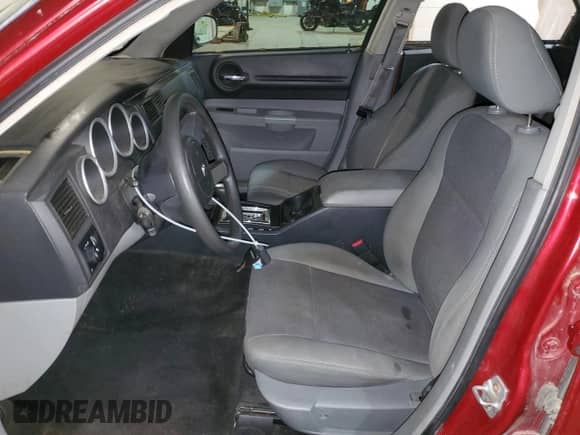 2007 Dodge Magnum with VIN 2D4FV47T47H701989, listed as a Copart auction lot 71868053 with 117,909 mi miles and Salvage title. Bid and sale history available at DreamBid. Image 7.