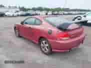 2005 Hyundai Tiburon GS z VIN KMHHM65D35U168510, wystawiony jako IAAI lot #42691110 z przebiegiem 128 386 mil mil oraz . Historia ofert i sprzedaży dostępna na DreamBid. Obrazek 3.