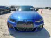 2024 BMW i4 M50 with VIN WBY33AW05RFS67158, listed as a Copart auction lot 71548875 with 8,729 mi miles and Salvage title. Bid and sale history available at DreamBid. Image 5.