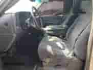 2002 Chevrolet Silverado 1500 LS with VIN 1GCEC14T32Z230279, listed as a Copart auction lot 65229845 with 190,494 mi miles and Salvage title. Bid and sale history available at DreamBid. Image 7.