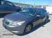 2009 Honda Accord LX-P with VIN 1HGCP26489A100211, listed as a IAAI auction lot 43358548 with 305,358 mi miles and . Bid and sale history available at DreamBid. Image 2.