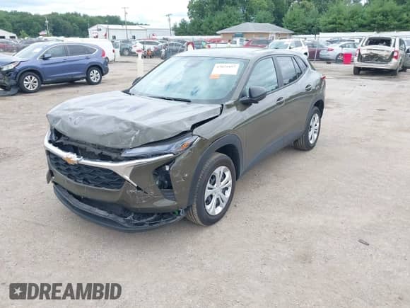 2024 Chevrolet Trax LS with VIN KL77LFE24RC103529, listed as a IAAI auction lot 43021897 with 30,289 mi miles and . Bid and sale history available at DreamBid. Image 2.