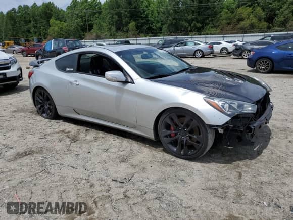 2013 Hyundai Genesis Coupe R-Spec z VIN KMHHU6KJ2DU103155, wystawiony jako Copart lot #57140335 z przebiegiem 117 760 mil mil oraz Szkoda całkowita • Salvage title. Historia ofert i sprzedaży dostępna na DreamBid. Obrazek 4.