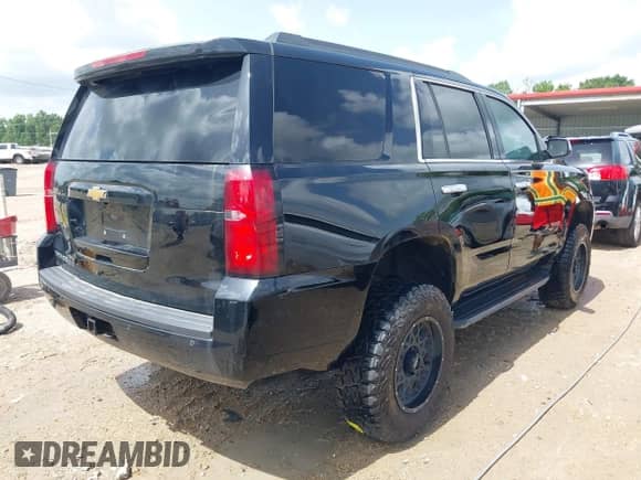 2019 Chevrolet Tahoe LS with VIN 1GNSKAKC0KR359757, listed as a IAAI auction lot 42696398 with Not provided miles and . Bid and sale history available at DreamBid. Image 4.