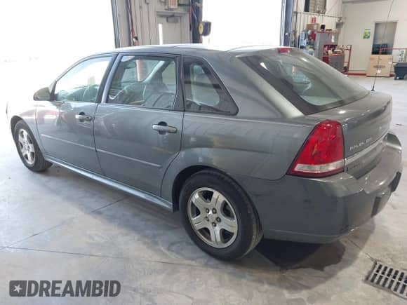 2004 Chevrolet Malibu Maxx LT z VIN 1G1ZU64884F174246, wystawiony jako IAAI lot #41767711 z przebiegiem 74 209 mil mil oraz . Historia ofert i sprzedaży dostępna na DreamBid. Obrazek 3.