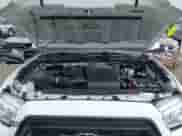 2021 Toyota Tacoma SR z VIN 5TFCZ5AN7MX267045, wystawiony jako IAAI lot #43321000 z przebiegiem 40 992 mil mil oraz . Historia ofert i sprzedaży dostępna na DreamBid. Obrazek 10.