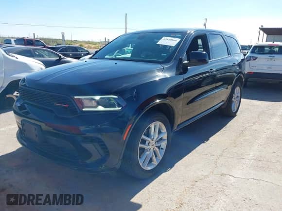 2023 Dodge Durango GT Premium with VIN 1C4RDJDG5PC687929, listed as a IAAI auction lot 42820866 with 51,519 mi miles and . Bid and sale history available at DreamBid. Image 2.