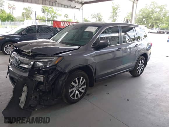 2021 Honda Pilot EX-L z VIN 5FNYF5H53MB030907, wystawiony jako IAAI lot #42454010 z przebiegiem 153 125 mil mil oraz . Historia ofert i sprzedaży dostępna na DreamBid. Obrazek 18.