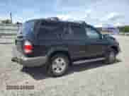 1999 Nissan Pathfinder XE with VIN JN8AR07Y5XW366845, listed as a Copart auction lot 70597005 with 182,350 mi miles and Salvage title. Bid and sale history available at DreamBid. Image 3.