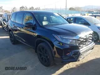 2022 Honda Passport Elite with VIN 5FNYF8H04NB004128, listed as a IAAI auction lot 41697029 with 30,450 mi miles and . Bid and sale history available at DreamBid. Image 1.