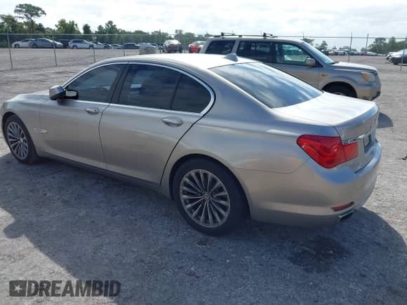 2011 BMW 7 Series 740i with VIN WBAKA4C50BC612511, listed as a IAAI auction lot 43550829 with 160,782 mi miles and . Bid and sale history available at DreamBid. Image 3.