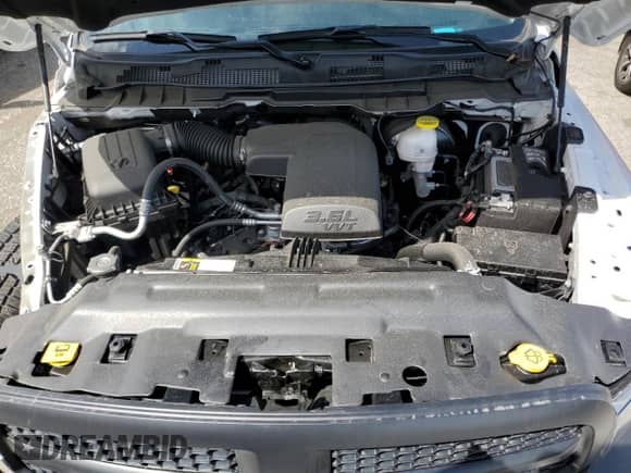 2024 Ram 1500 Express z VIN 1C6RR6KG9RS154502, wystawiony jako Copart lot #49339305 z przebiegiem 5 992 mil mil oraz Szkoda całkowita • Salvage title. Historia ofert i sprzedaży dostępna na DreamBid. Obrazek 11.