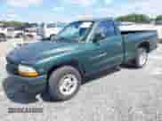 2000 Dodge Dakota with VIN 1B7FL26N0YS551920, listed as a IAAI auction lot 42937737 with 250,459 mi miles and . Bid and sale history available at DreamBid. Image 2.