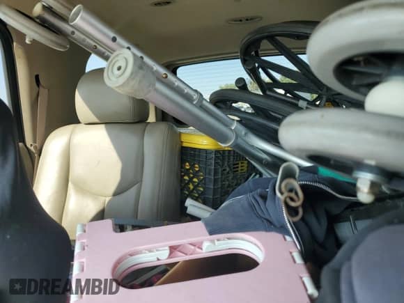 2004 Chevrolet Tahoe LS with VIN 1GNEC13T44R294049, listed as a Copart auction lot 59900565 with 149,379 mi miles and Salvage title. Bid and sale history available at DreamBid. Image 10.