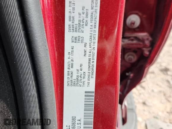 2025 Ram 1500 Tradesman with VIN 1C6RRFGG7SN606380, listed as a Copart auction lot 64974215 with 15,603 mi miles and Salvage title. Bid and sale history available at DreamBid. Image 12.