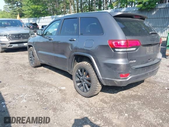 2017 Jeep Grand Cherokee Altitude with VIN 1C4RJFAG4HC807439, listed as a IAAI auction lot 42468652 with 149,807 mi miles and . Bid and sale history available at DreamBid. Image 3.