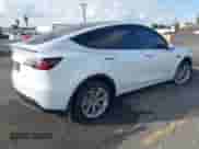 2023 Tesla Model Y Long Range with VIN 7SAYGDEE0PA135579, listed as a IAAI auction lot 43196811 with 44,886 mi miles and . Bid and sale history available at DreamBid. Image 4.