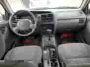 2000 Chevrolet Tracker with VIN 2CNBJ13C0Y6917889, listed as a Copart auction lot 42703105 with Not provided miles and Salvage title. Bid and sale history available at DreamBid. Image 8.