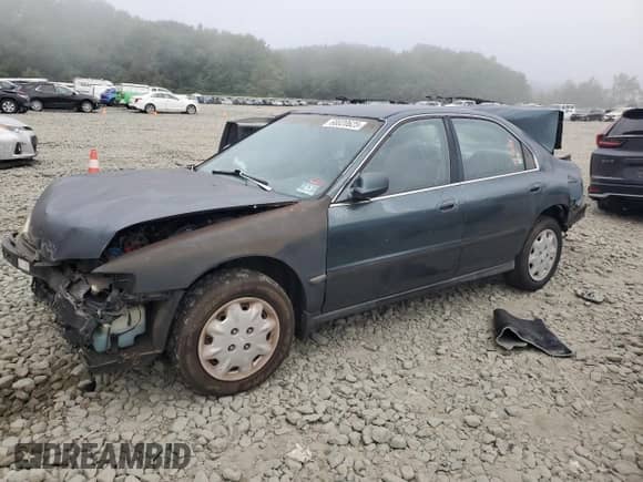 1997 Honda Accord LX with VIN 1HGCD5638VA234390, listed as a Copart auction lot 68820625 with 184,122 mi miles and Salvage title. Bid and sale history available at DreamBid. Image 1.