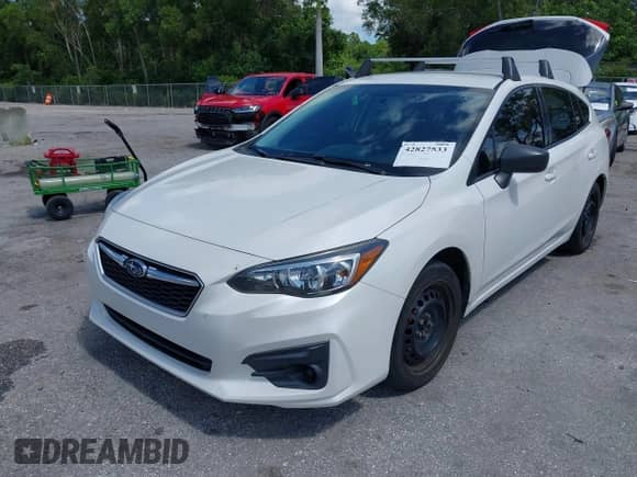 2018 Subaru Impreza with VIN 4S3GTAA65J3701017, listed as a IAAI auction lot 42827533 with 109,708 mi miles and . Bid and sale history available at DreamBid. Image 18.