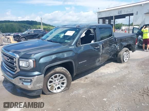2017 GMC Sierra 1500 SLE with VIN 3GTU2MEC0HG307956, listed as a IAAI auction lot 42756643 with 55,325 mi miles and . Bid and sale history available at DreamBid. Image 2.