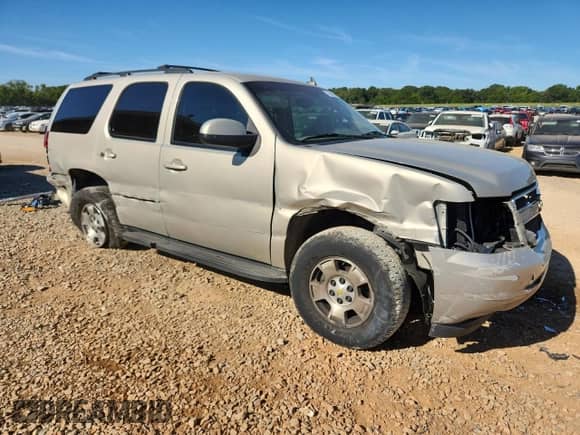 2012 Chevrolet Tahoe LS with VIN 1GNSCAE00CR209583, listed as a Copart auction lot 70043565 with 179,537 mi miles and Salvage title. Bid and sale history available at DreamBid. Image 4.