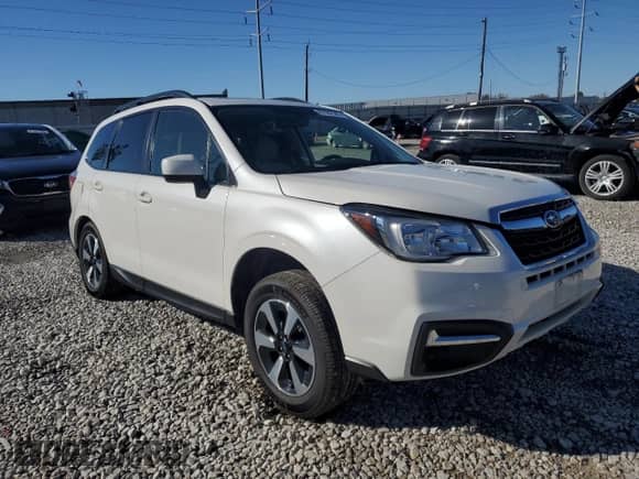2018 Subaru Forester Premium z VIN JF2SJAEC2JH571704, wystawiony jako Copart lot #87062545 z przebiegiem 103 181 mil mil oraz Szkoda całkowita • Salvage title. Historia ofert i sprzedaży dostępna na DreamBid. Obrazek 4.