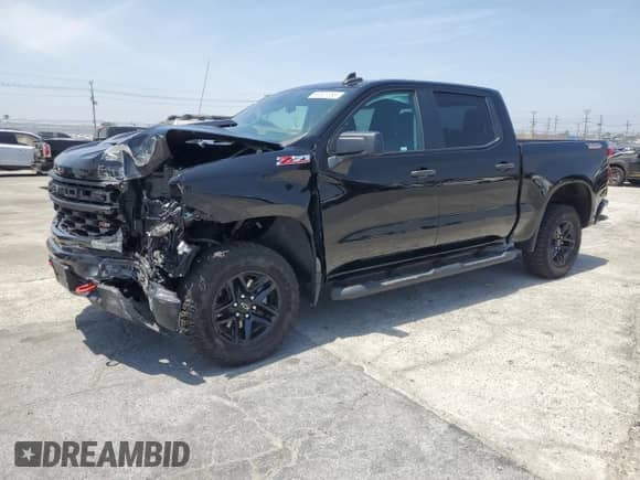 2024 Chevrolet Silverado 1500 Custom Trail Boss with VIN 3GCPDCEKXRG220933, listed as a Copart auction lot 60823785 with 20,577 mi miles and Salvage title. Bid and sale history available at DreamBid. Image 1.