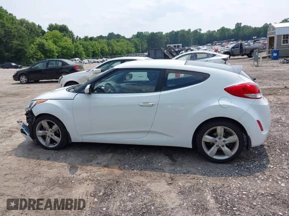 2015 Hyundai Veloster with VIN KMHTC6ADXFU232692, listed as a IAAI auction lot 42407054 with 80,745 mi miles and . Bid and sale history available at DreamBid. Image 14.