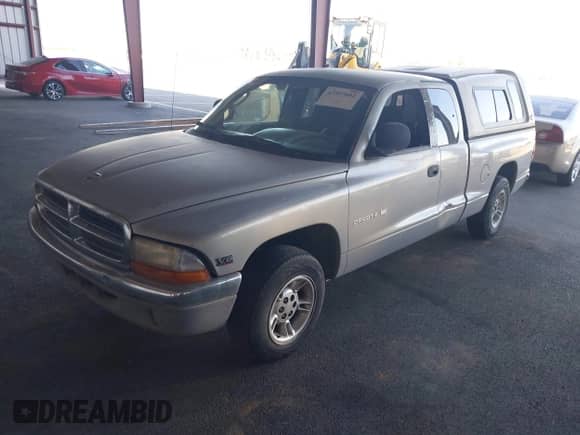 2000 Dodge Dakota with VIN 1B7GL22X6YS526029, listed as a IAAI auction lot 43597002 with 208,306 mi miles and . Bid and sale history available at DreamBid. Image 2.