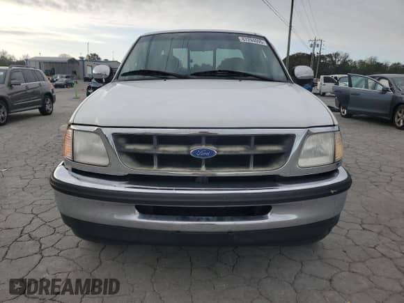1997 Ford F-150 с VIN 1FTDX17W0VNB72214, выставлен на аукционе Copart как лот 87294095 с пробегом 309 147 миль миль и Чистый • Clean title. История ставок и продаж доступна на DreamBid. Изображение 5.