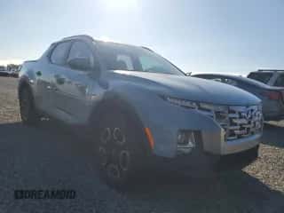 2022 Hyundai Santa Cruz SEL с VIN 5NTJCDAEXNH035265, выставлен на аукционе Copart как лот 76173054 с пробегом 43 228 миль миль и На запчасти • Non repairable. История ставок и продаж доступна на DreamBid. Изображение 4.