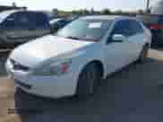 2004 Honda Accord EX with VIN JHMCM56774C032000, listed as a IAAI auction lot 42965261 with 147,206 mi miles and . Bid and sale history available at DreamBid. Image 2.