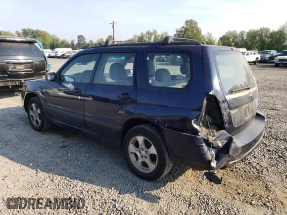 2006 Subaru Forester X with VIN JF1SG63666H708163, listed as a Copart auction lot 71688305 with 100,388 mi miles and Salvage title. Bid and sale history available at DreamBid. Image 2.