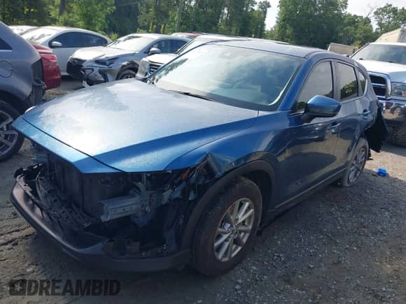 2023 Mazda CX-5 S Preferred z VIN JM3KFBCM3P0255230, wystawiony jako IAAI lot #42420823 z przebiegiem 69 331 mil mil oraz . Historia ofert i sprzedaży dostępna na DreamBid. Obrazek 17.