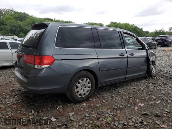 2010 Honda Odyssey LX with VIN 5FNRL3H28AB068278, listed as a Copart auction lot 65247315 with 181,848 mi miles and Salvage title. Bid and sale history available at DreamBid. Image 3.