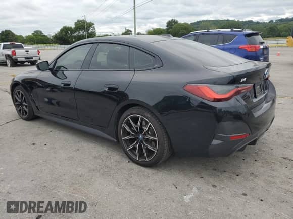 2023 BMW i4 eDrive40 с VIN WBY73AW06PFN95798, выставлен на аукционе Copart как лот 67530055 с пробегом 9 245 миль миль и Списание • Salvage title. История ставок и продаж доступна на DreamBid. Изображение 2.