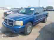 2006 Dodge Dakota SLT with VIN 1D7HW48K96S504631, listed as a IAAI auction lot 42885816 with 183,474 mi miles and . Bid and sale history available at DreamBid. Image 2.