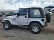 2004 Jeep Wrangler X z VIN 1J4FA39S04P739230, wystawiony jako Copart lot #84052405 z przebiegiem 97 855 mil mil oraz Szkoda całkowita • Salvage title. Historia ofert i sprzedaży dostępna na DreamBid. Obrazek 2.
