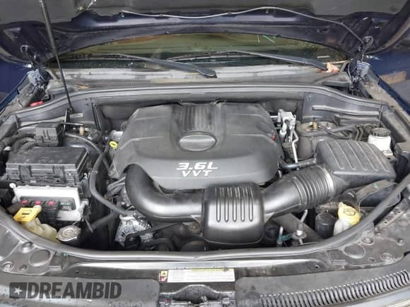 2012 Jeep Grand Cherokee Overland z VIN 1C4RJFCG1CC262788, wystawiony jako IAAI lot #43212743 z przebiegiem 211 731 mil mil oraz . Historia ofert i sprzedaży dostępna na DreamBid. Obrazek 10.