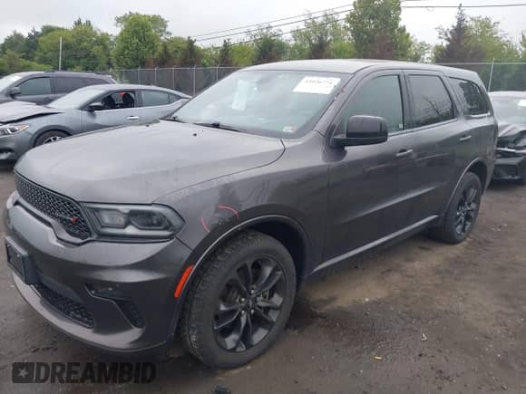 2021 Dodge Durango SXT Plus with VIN 1C4RDJAG2MC792637, listed as a IAAI auction lot 43026771 with 105,808 mi miles and . Bid and sale history available at DreamBid. Image 2.