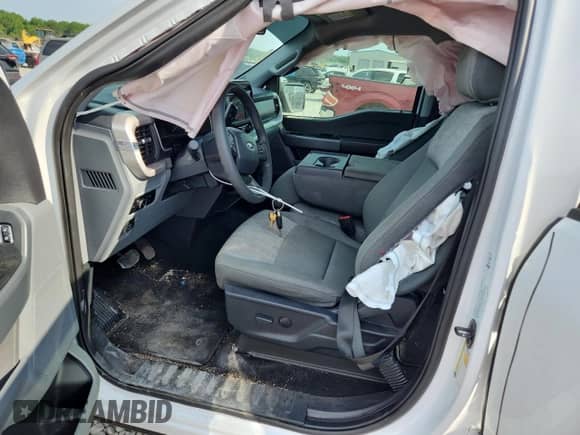 2023 Ford F-150 Lariat with VIN 1FTFW1E89PFA91516, listed as a Copart auction lot 61666315 with 65,711 mi miles and Salvage title. Bid and sale history available at DreamBid. Image 7.