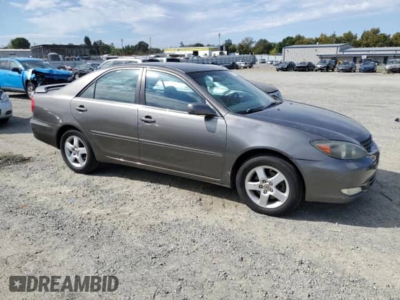 2002 Toyota Camry XLE with VIN 4T1BF32K62U520508, listed as a Copart auction lot 81731375 with 163,519 mi miles and Salvage title. Bid and sale history available at DreamBid. Image 4.