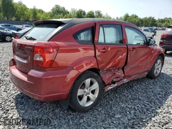 2010 Dodge Caliber Mainstreet z VIN 1B3CB3HA9AD642069, wystawiony jako Copart lot #67555465 z przebiegiem Nie podano mil oraz Szkoda całkowita • Salvage title. Historia ofert i sprzedaży dostępna na DreamBid. Obrazek 3.
